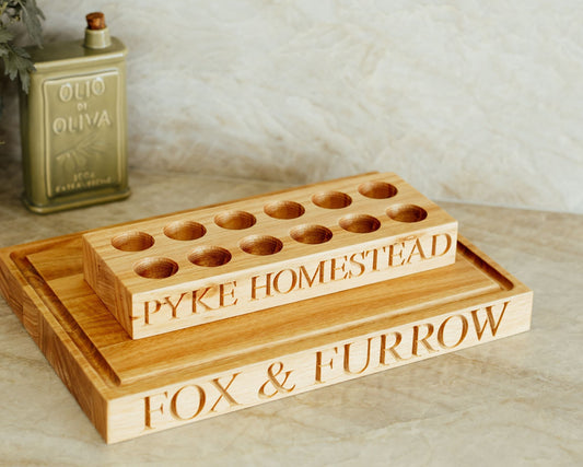 Wooden product with 'Pyke Homestead Fox & Furrow' branding on a marble surface.